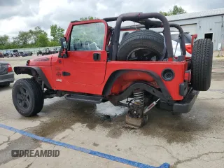 2000 Jeep Wrangler SE with VIN 1J4FA29P6YP793045, listed as a Copart auction lot 58756715 with 202,110 mi miles and Salvage title. Bid and sale history available at DreamBid. Image 2.