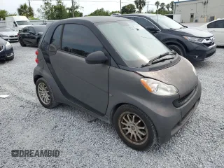 2012 Smart fortwo Pure z VIN WMEEJ3BA2CK519118, wystawiony jako Copart lot #57813115 z przebiegiem 127 472 mil mil oraz Tytuł czysty. Historia ofert i sprzedaży dostępna na DreamBid. Obrazek 4.
