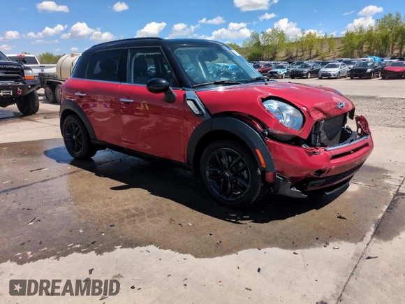 2015 MINI Countryman S with VIN WMWZC3C58FWT06695, listed as a Copart auction lot 56408325 with 99,673 mi miles and Salvage title. Bid and sale history available at DreamBid. Image 13.