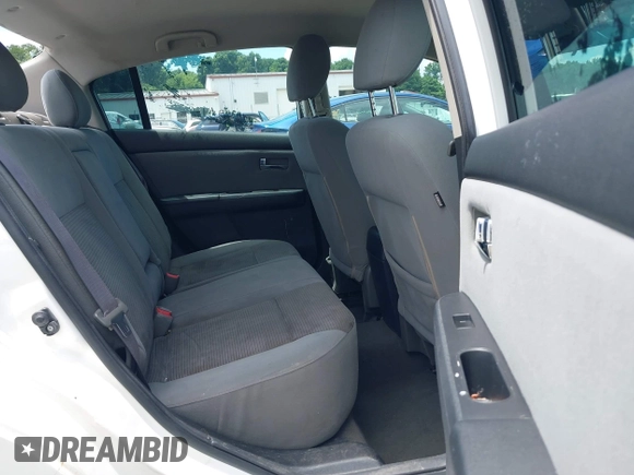 2011 Nissan Sentra S with VIN 3N1AB6AP8BL631164, listed as a IAAI auction lot 42650002 with 191,125 mi miles and . Bid and sale history available at DreamBid. Image 8.