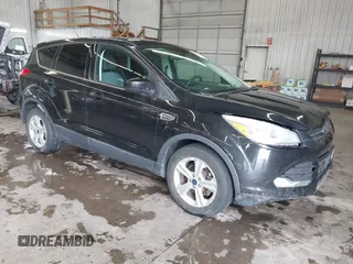 2014 Ford Escape SE with VIN 1FMCU0GX4EUC50972, listed as a IAAI auction lot 41953559 with 134,936 mi miles. Bid and sale history available at carsss.com. Image 1.