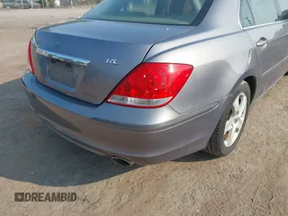 2006 Acura RL z VIN JH4KB16516C008190, wystawiony jako IAAI lot #42433002 z przebiegiem 216 426 mil mil oraz . Historia ofert i sprzedaży dostępna na DreamBid. Obrazek 6.