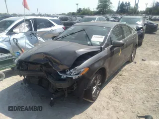2019 Ford Fusion SE with VIN 3FA6P0HD5KR248153, listed as a IAAI auction lot 36809480 with 125,712 mi miles. Bid and sale history available at carsss.com. Image 2.