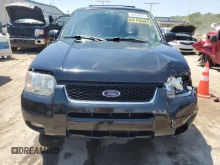 2003 Ford Escape Limited with VIN 1FMCU94113KE05720, listed as a Copart auction lot 58937564 with 120,020 mi miles and Salvage Title. Bid and sale history available at carsss.com. Image 5.