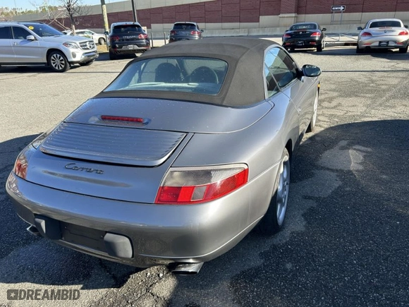 2001 Porsche 911 Carrera with VIN WP0CA29931S653922, listed as a IAAI auction lot 41811925 with NaN miles. Bid and sale history available at carsss.com. Image 4.