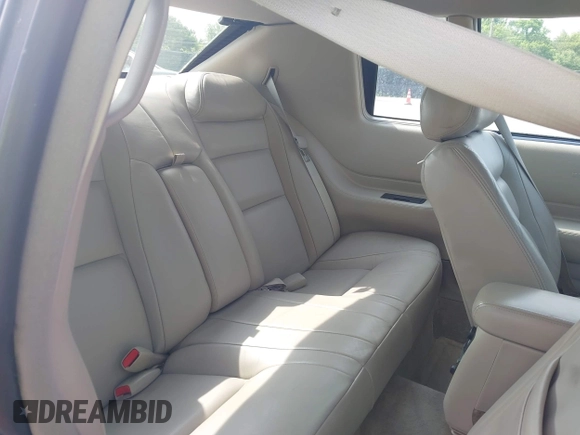 2001 Cadillac Eldorado ESC with VIN 1G6EL12Y01B104230, listed as a IAAI auction lot 42521397 with 60,570 mi miles and . Bid and sale history available at DreamBid. Image 8.