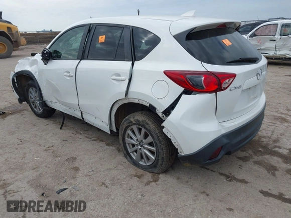 2016 Mazda CX-5 Touring with VIN JM3KE2CY1G0888850, listed as a IAAI auction lot 41562701 with 1 mi miles. Bid and sale history available at carsss.com. Image 3.
