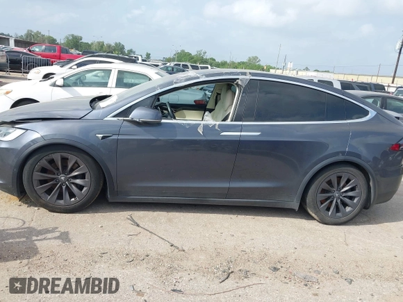 2018 Tesla Model X 75D with VIN 5YJXCDE21JF139712, listed as a IAAI auction lot 41905326 with Not Provided miles and . Bid and sale history available at carsss.com. Image 14.