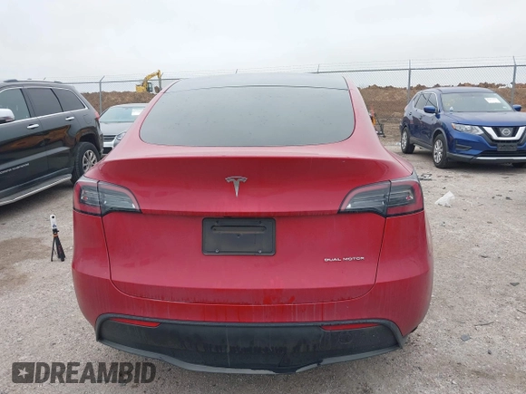 2023 Tesla Model Y Long Range with VIN 7SAYGDEE6PA027497, listed as a IAAI auction lot 41491072 with 24,962 mi miles and . Bid and sale history available at DreamBid. Image 16.
