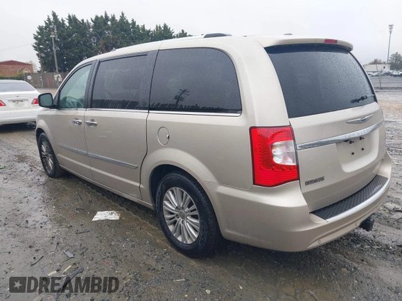 2013 Chrysler Town & Country Limited with VIN 2C4RC1GG2DR536256, listed as a IAAI auction lot 42027427 with 126,447 mi miles. Bid and sale history available at carsss.com. Image 3.