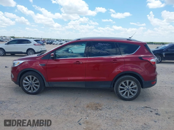 2018 Ford Escape Titanium with VIN 1FMCU0J96JUD58854, listed as a IAAI auction lot 42590609 with 77,825 mi miles and . Bid and sale history available at DreamBid. Image 14.