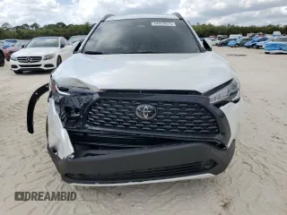 2024 Toyota Corolla Cross LE z VIN 7MUBAAAG9RV110858, wystawiony jako Copart lot #54520675 z przebiegiem 5 727 mil mil oraz Szkoda całkowita • Salvage title. Historia ofert i sprzedaży dostępna na DreamBid. Obrazek 5.
