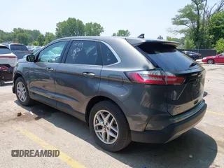 2024 Ford Edge SEL z VIN 2FMPK4J98RBA88719, wystawiony jako IAAI lot #42465705 z przebiegiem 26 101 mil mil oraz . Historia ofert i sprzedaży dostępna na DreamBid. Obrazek 3.