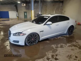2012 Jaguar XF z VIN SAJWA0FB8CLS28087, wystawiony jako Copart lot #89109535 z przebiegiem 130 807 mil mil oraz Szkody całkowita. Historia ofert i sprzedaży dostępna na DreamBid. Obrazek 1.