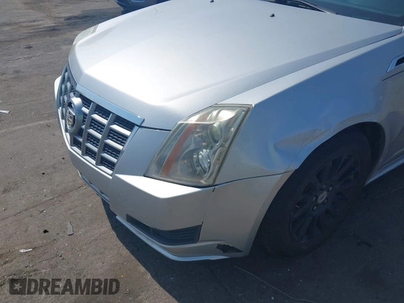2012 Cadillac CTS with VIN 1G6DC5E51C0156873, listed as a IAAI auction lot 42587421 with 169,006 mi miles and . Bid and sale history available at DreamBid. Image 13.