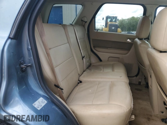 2012 Ford Escape Limited z VIN 1FMCU0EG9CKA20453, wystawiony jako Copart lot #56009755 z przebiegiem 190 000 mil mil oraz Szkoda całkowita • Salvage title. Historia ofert i sprzedaży dostępna na DreamBid. Obrazek 11.