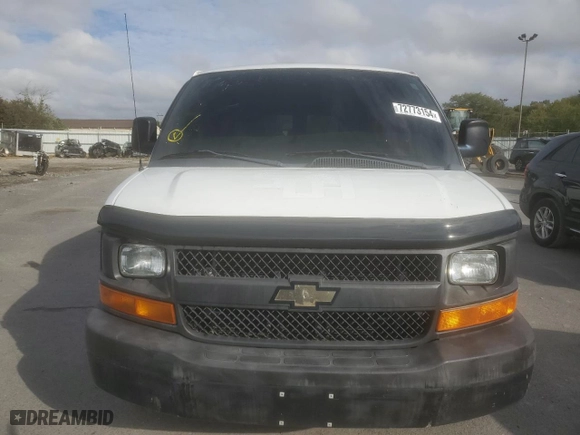 2014 Chevrolet Express Passenger 1LS with VIN 1GAZGZFAXE1105162, listed as a Copart auction lot 72773154 with 97,950 mi miles and Salvage Title. Bid and sale history available at carsss.com. Image 5.