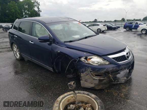 2011 Mazda CX-9 Grand Touring with VIN JM3TB2DA0B0320628, listed as a Copart auction lot 56310725 with 119,068 mi miles and Salvage title. Bid and sale history available at DreamBid. Image 4.