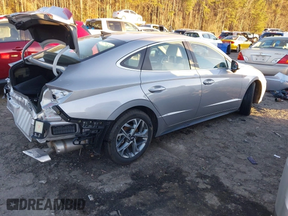 2023 Hyundai Sonata SEL z VIN KMHL64JA1PA321006, wystawiony jako IAAI lot #38313188 z przebiegiem 12 619 mil mil oraz . Historia ofert i sprzedaży dostępna na DreamBid. Obrazek 4.