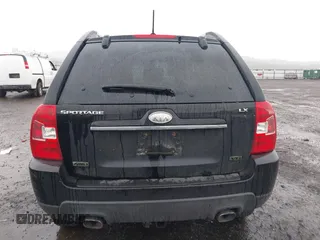 2009 Kia Sportage LX with VIN KNDJE723497612745, listed as a IAAI auction lot 41974301 with 141,110 mi miles and . Bid and sale history available at carsss.com. Image 16.