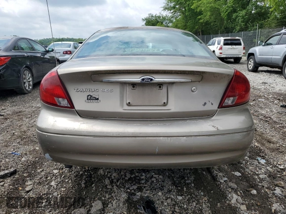 2003 Ford Taurus SES Standard z VIN 1FAFP55U33A123732, wystawiony jako Copart lot #58837395 z przebiegiem 169 159 mil mil oraz Szkoda całkowita • Salvage title. Historia ofert i sprzedaży dostępna na DreamBid. Obrazek 6.