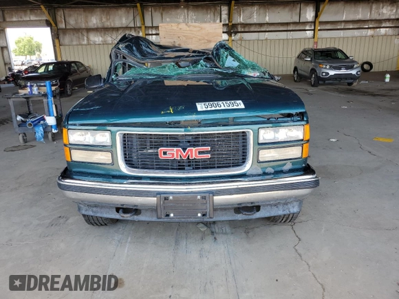 1997 GMC Sierra 1500 z VIN 2GTEK19RXV1501674, wystawiony jako Copart lot #59061595 z przebiegiem 138 998 mil mil oraz Szkoda całkowita • Salvage title. Historia ofert i sprzedaży dostępna na DreamBid. Obrazek 5.