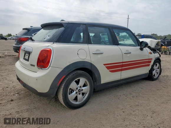 2015 MINI Hardtop 4 Door with VIN WMWXS5C51FT831167, listed as a Copart auction lot 52778685 with 52,770 mi miles and Salvage title. Bid and sale history available at DreamBid. Image 3.
