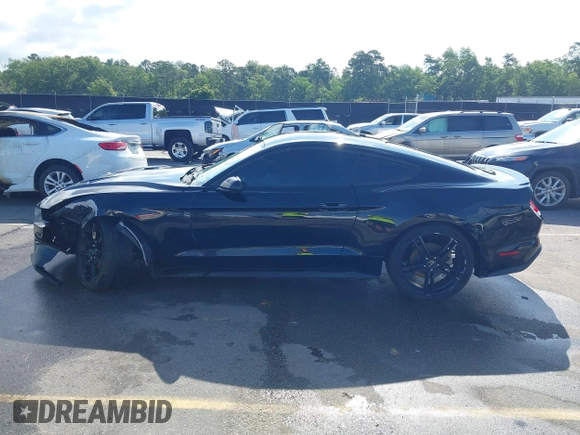 2019 Ford Mustang EcoBoost with VIN 1FA6P8THXK5124729, listed as a IAAI auction lot 42384176 with 134,028 mi miles and . Bid and sale history available at DreamBid. Image 14.
