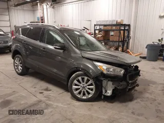 2017 Ford Escape Titanium with VIN 1FMCU9JD7HUE46427, listed as a IAAI auction lot 41808083 with 55,201 mi miles. Bid and sale history available at carsss.com. Image 1.