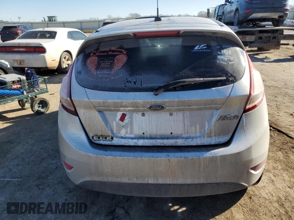 2016 Ford Fiesta S z VIN 3FADP4TJ0GM120600, wystawiony jako Copart lot #42301475 z przebiegiem Nie podano mil oraz Szkoda całkowita • Salvage title. Historia ofert i sprzedaży dostępna na DreamBid. Obrazek 6.