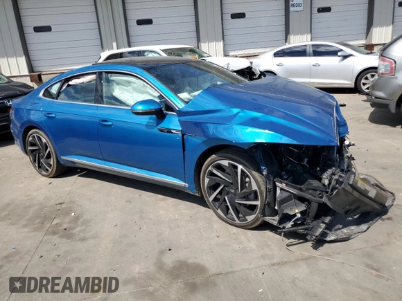 2023 Volkswagen Arteon SEL Premium R-Line z VIN WVWTR7AN8PE002467, wystawiony jako Copart lot #72014284 z przebiegiem Nie podano mil oraz Szkoda całkowita • Salvage title. Historia ofert i sprzedaży dostępna na DreamBid. Obrazek 4.