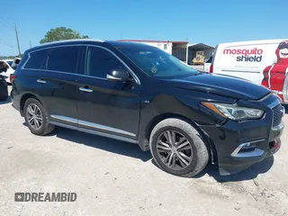 2017 Infiniti QX60 with VIN 5N1DL0MN3HC523856, listed as a IAAI auction lot 42036846 with 218,278 mi miles. Bid and sale history available at carsss.com. Image 1.