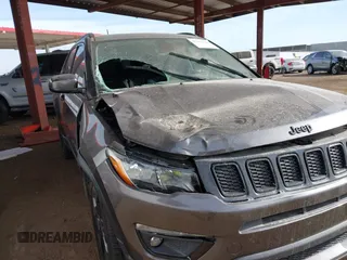 2021 Jeep Compass Altitude with VIN 3C4NJCBB9MT560370, listed as a IAAI auction lot 41583996 with 75,955 mi miles and . Bid and sale history available at DreamBid. Image 6.