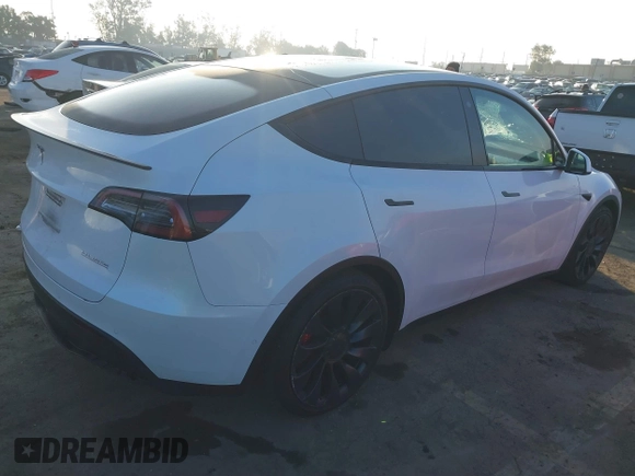 2021 Tesla Model Y Performance with VIN 5YJYGDEF2MF258711, listed as a IAAI auction lot 41367832 with 47,662 mi miles and . Bid and sale history available at DreamBid. Image 4.