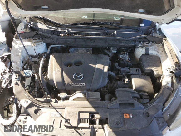 2014 Mazda CX-5 Sport with VIN JM3KE2BEXE0332590, listed as a Copart auction lot 87534365 with Not Provided miles and Salvage Title. Bid and sale history available at carsss.com. Image 11.