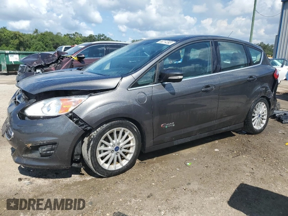 2016 Ford C-Max Energi SEL with VIN 1FADP5CU0GL101658, listed as a Copart auction lot 68214393 with 66,390 mi miles. Bid and sale history available at carsss.com. Image 1.