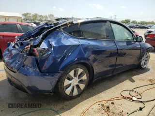 2022 Tesla Model Y Long Range z VIN 7SAYGDEE8NF447410, wystawiony jako Copart lot #54860765 z przebiegiem Nie podano mil oraz Szkody całkowita. Historia ofert i sprzedaży dostępna na DreamBid. Obrazek 3.