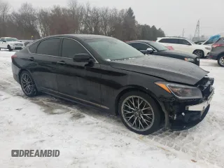 2019 Genesis G80 3.3T Sport with VIN KMHGN4JB0KU285684, listed as a Copart auction lot 42705015 with 104,352 mi miles and Salvage Title. Bid and sale history available at carsss.com. Image 4.