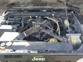 2009 Jeep Wrangler X with VIN 1J4FA24159L768617, listed as a IAAI auction lot 41686830 with 100,478 mi miles and . Bid and sale history available at DreamBid. Image 10.