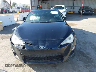 2014 Scion FR-S z VIN JF1ZNAA11E8702526, wystawiony jako IAAI lot #42068499 z przebiegiem 79 312 mil mil oraz . Historia ofert i sprzedaży dostępna na DreamBid. Obrazek 11.