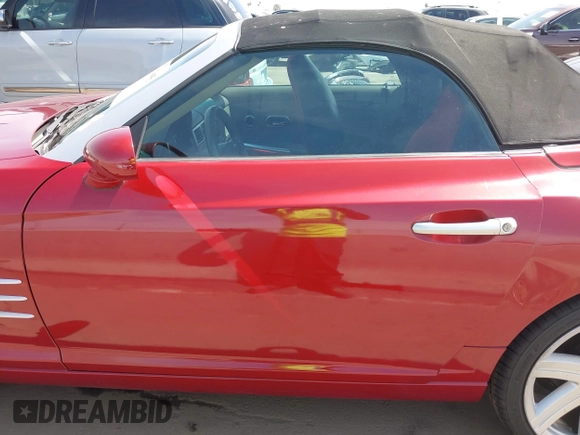 2005 Chrysler Crossfire Limited z VIN 1C3AN65L65X057205, wystawiony jako IAAI lot #41878855 z przebiegiem 209 199 mil mil oraz . Historia ofert i sprzedaży dostępna na DreamBid. Obrazek 14.