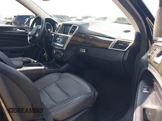 2015 Mercedes-Benz M 400 with VIN 4JGDA5GB4FA559004, listed as a IAAI auction lot 41932299 with 84,749 mi miles and . Bid and sale history available at DreamBid. Image 5.