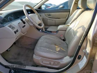 2000 Toyota Avalon XL z VIN 4T1BF28B7YU074685, wystawiony jako Copart lot #54523145 z przebiegiem 172 258 mil mil oraz Szkoda całkowita • Salvage title. Historia ofert i sprzedaży dostępna na DreamBid. Obrazek 7.