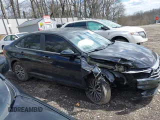 2021 Volkswagen Jetta S z VIN 3VWC57BU0MM035340, wystawiony jako IAAI lot #42045819 z przebiegiem 76 751 mil mil oraz . Historia ofert i sprzedaży dostępna na DreamBid. Obrazek 13.