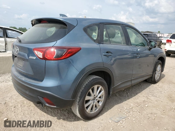 2015 Mazda CX-5 Sport z VIN JM3KE2BE8F0434116, wystawiony jako Copart lot #60712625 z przebiegiem 300 405 mil mil oraz Szkoda całkowita • Salvage title. Historia ofert i sprzedaży dostępna na DreamBid. Obrazek 3.