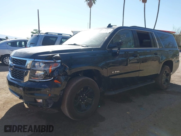 2020 Chevrolet Suburban LT with VIN 1GNSKHKC5LR303081, listed as a IAAI auction lot 41896511 with 60,121 mi miles and . Bid and sale history available at DreamBid. Image 16.