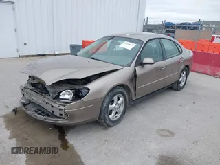 2002 Ford Taurus SES Standard with VIN 1FAFP55U52G135781, listed as a IAAI auction lot 41520037 with 196,207 mi miles. Bid and sale history available at carsss.com. Image 17.
