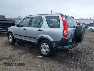 2006 Honda CR-V LX with VIN JHLRD78536C035954, listed as a IAAI auction lot 42043220 with 250,337 mi miles and . Bid and sale history available at carsss.com. Image 3.