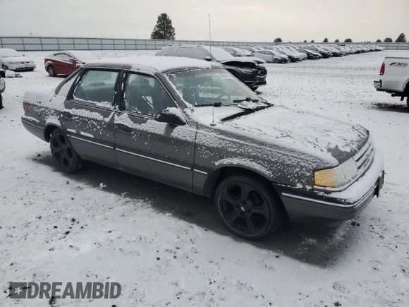 1990 Ford Tempo с VIN 1FAPP36X4LK167346, выставлен на аукционе Copart как лот 84089494 с пробегом 66 291 миль миль и Списание • Salvage title. История ставок и продаж доступна на DreamBid. Изображение 4.