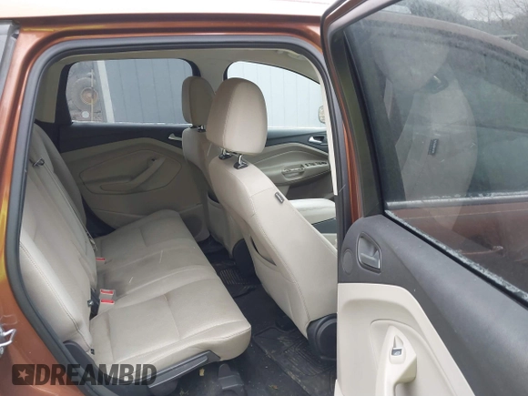 2017 Ford Escape SE with VIN 1FMCU9G96HUC12475, listed as a IAAI auction lot 41741342 with 102,823 mi miles. Bid and sale history available at carsss.com. Image 8.